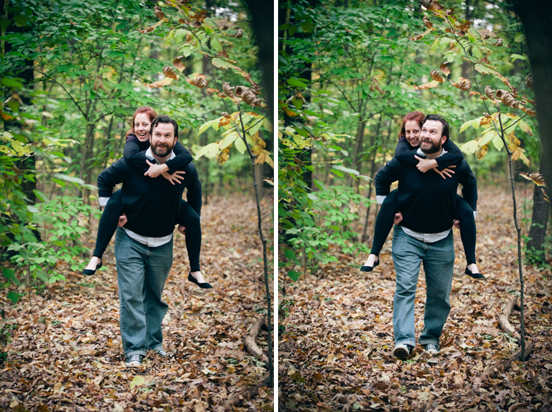 A couple walks and rides piggy back through the trees at the Penn State Arborteum the week of their wedding.