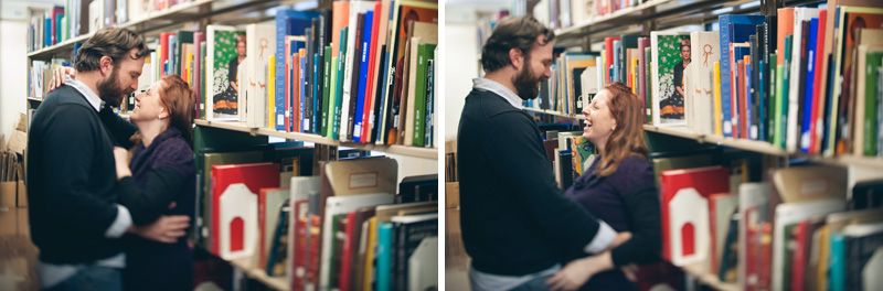 A wedding photographer takes a candid, photojournalistic approach to photographing a couple before their wedding in the art section of the State College library near a Frida Kahlo book.